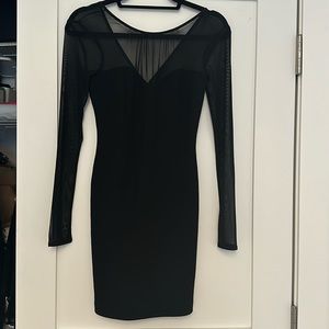 NWT BCBGeneration black bodycon dress with sheer sleeves and neckline, size 0